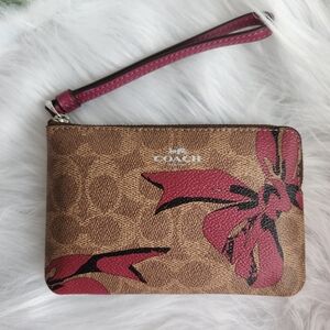 Coach Brown Wristlet with Pink Floral Design